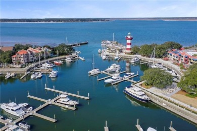 Updated and fully furnished top-floor corner unit in Lighthouse on Harbour Town Golf Links in South Carolina - for sale on GolfHomes.com, golf home, golf lot