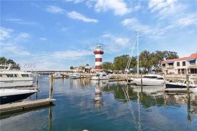 Updated and fully furnished top-floor corner unit in Lighthouse on Harbour Town Golf Links in South Carolina - for sale on GolfHomes.com, golf home, golf lot