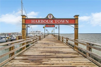 Updated and fully furnished top-floor corner unit in Lighthouse on Harbour Town Golf Links in South Carolina - for sale on GolfHomes.com, golf home, golf lot