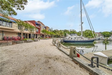 Updated and fully furnished top-floor corner unit in Lighthouse on Harbour Town Golf Links in South Carolina - for sale on GolfHomes.com, golf home, golf lot