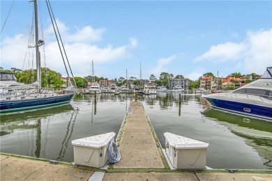 Updated and fully furnished top-floor corner unit in Lighthouse on Harbour Town Golf Links in South Carolina - for sale on GolfHomes.com, golf home, golf lot
