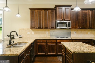 Live the lifestyle you deserve in Crystal Lake Golf & Country on Crystal Lake Golf and Country Club in Georgia - for sale on GolfHomes.com, golf home, golf lot
