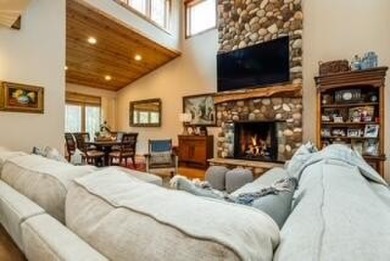 Classic Grand Beach Home that offers LOTS of OPTIONS!  This on Grand Beach Municipal Golf Course in Michigan - for sale on GolfHomes.com, golf home, golf lot