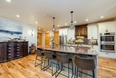 Classic Grand Beach Home that offers LOTS of OPTIONS!  This on Grand Beach Municipal Golf Course in Michigan - for sale on GolfHomes.com, golf home, golf lot
