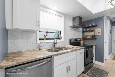 Welcome to this BEAUTIFULLY updated home nestled on the 18TH on Sugarmill Woods Golf and Country Club in Florida - for sale on GolfHomes.com, golf home, golf lot