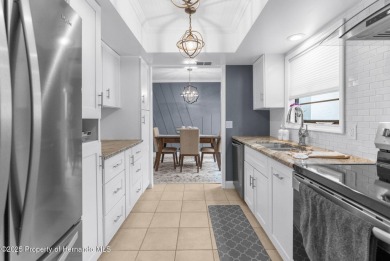 Welcome to this BEAUTIFULLY updated home nestled on the 18TH on Sugarmill Woods Golf and Country Club in Florida - for sale on GolfHomes.com, golf home, golf lot