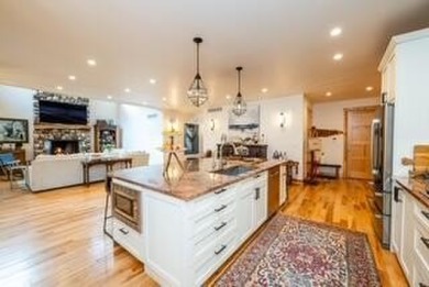 Classic Grand Beach Home that offers LOTS of OPTIONS!  This on Grand Beach Municipal Golf Course in Michigan - for sale on GolfHomes.com, golf home, golf lot