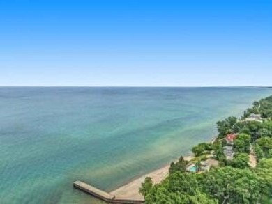 Classic Grand Beach Home that offers LOTS of OPTIONS!  This on Grand Beach Municipal Golf Course in Michigan - for sale on GolfHomes.com, golf home, golf lot