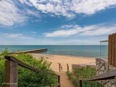 Classic Grand Beach Home that offers LOTS of OPTIONS!  This on Grand Beach Municipal Golf Course in Michigan - for sale on GolfHomes.com, golf home, golf lot