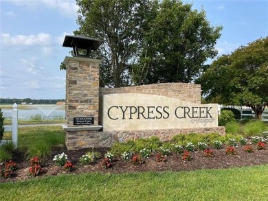 Welcome home to an extravagant country club lifestyle in on Cypress Creek Golfers Club in Virginia - for sale on GolfHomes.com, golf home, golf lot