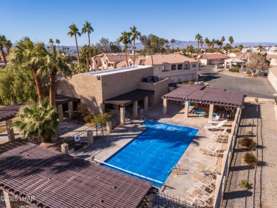 Desirable end unit at Stonebridge golf course community! on London Bridge Golf Course in Arizona - for sale on GolfHomes.com, golf home, golf lot