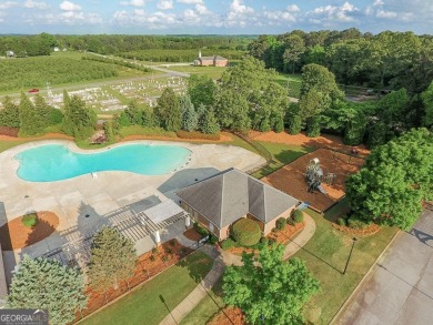 Welcome to 2589 Lake Erma Drive-a move-in ready luxury retreat on Crystal Lake Golf and Country Club in Georgia - for sale on GolfHomes.com, golf home, golf lot