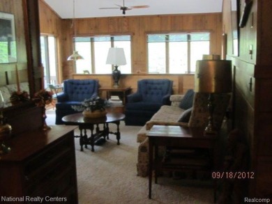 Welcome to 4010 Owl. This custom built Mahalak contemporary on Lost Lake Woods Club in Michigan - for sale on GolfHomes.com, golf home, golf lot