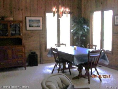 Welcome to 4010 Owl. This custom built Mahalak contemporary on Lost Lake Woods Club in Michigan - for sale on GolfHomes.com, golf home, golf lot