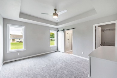 Welcome to this 3-bedroom, 2-bath home in Luxemburg, built in on NorthBrook Country Club in Wisconsin - for sale on GolfHomes.com, golf home, golf lot