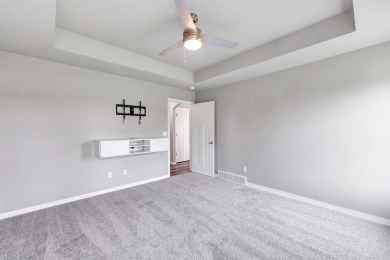 Welcome to this 3-bedroom, 2-bath home in Luxemburg, built in on NorthBrook Country Club in Wisconsin - for sale on GolfHomes.com, golf home, golf lot