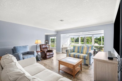 Beautifully renovated 3-bedroom, 2-bath second-floor condo on Quail Ridge Golf Course and Country Club in Florida - for sale on GolfHomes.com, golf home, golf lot
