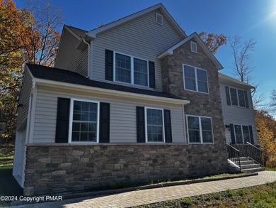 Experience Refined Living in The Estate at Great Bear Nestled on Caesars Pocono Palace Resort in Pennsylvania - for sale on GolfHomes.com, golf home, golf lot