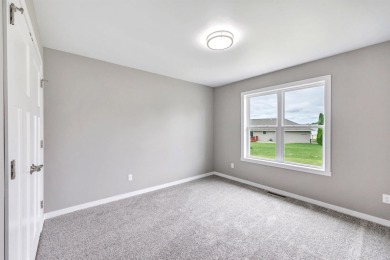 Welcome to this 3-bedroom, 2-bath home in Luxemburg, built in on NorthBrook Country Club in Wisconsin - for sale on GolfHomes.com, golf home, golf lot