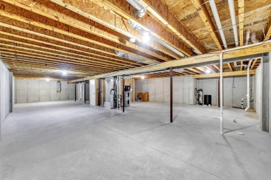 Welcome to this 3-bedroom, 2-bath home in Luxemburg, built in on NorthBrook Country Club in Wisconsin - for sale on GolfHomes.com, golf home, golf lot