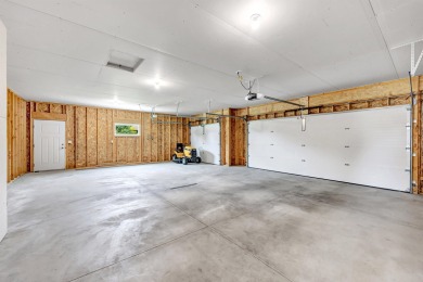 Welcome to this 3-bedroom, 2-bath home in Luxemburg, built in on NorthBrook Country Club in Wisconsin - for sale on GolfHomes.com, golf home, golf lot
