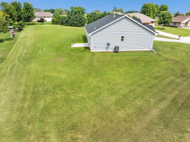 Welcome to this 3-bedroom, 2-bath home in Luxemburg, built in on NorthBrook Country Club in Wisconsin - for sale on GolfHomes.com, golf home, golf lot