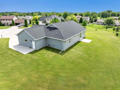 Welcome to this 3-bedroom, 2-bath home in Luxemburg, built in on NorthBrook Country Club in Wisconsin - for sale on GolfHomes.com, golf home, golf lot
