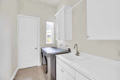 Beautifully updated estate home situated alongside Pointe West's on The Club At Pointe West in Florida - for sale on GolfHomes.com, golf home, golf lot