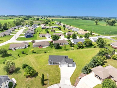 Welcome to this 3-bedroom, 2-bath home in Luxemburg, built in on NorthBrook Country Club in Wisconsin - for sale on GolfHomes.com, golf home, golf lot