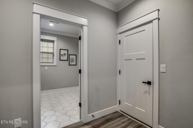 Welcome to 115 Talah Way, a stunning better than new home in the on Toqua Golf Course - Loudon County in Tennessee - for sale on GolfHomes.com, golf home, golf lot
