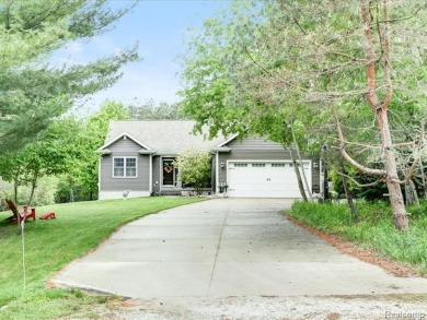 ESCAPE TO THIS SPACIOUS RANCH STYLE HOME IN LEXINGTON! NESTLED on Lakeview Hills Country Club and Resort  in Michigan - for sale on GolfHomes.com, golf home, golf lot