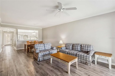 TEN MINUTES TO THE BEACH!   Enjoy stunning golf course and water on Capri Isle Golf Club in Florida - for sale on GolfHomes.com, golf home, golf lot
