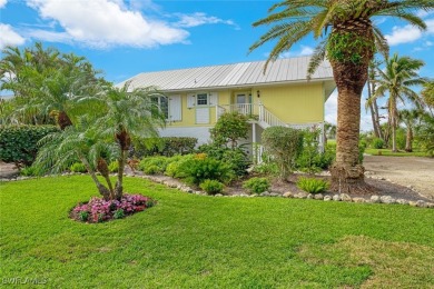Welcome to, a cozy elevated 'island cottage' perfectly situated on The Dunes Golf and Tennis Club in Florida - for sale on GolfHomes.com, golf home, golf lot