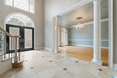 This stunning all-brick executive home sits on a private 1 on Riverchase Country Club in Alabama - for sale on GolfHomes.com, golf home, golf lot