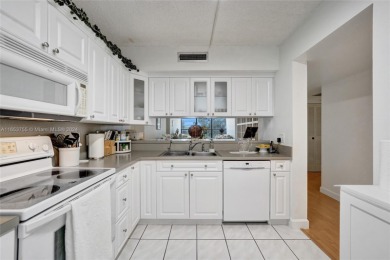 Welcome to this TOTALLY REMODELED condo located in an all-age on Pine Island Ridge Country Club in Florida - for sale on GolfHomes.com, golf home, golf lot