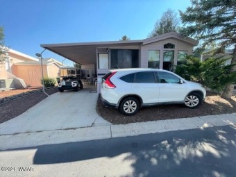 SQUARE FOOTAGE!! Come take a look at this 1bd/2ba park model in on Juniper Ridge R.V. Golf Resort in Arizona - for sale on GolfHomes.com, golf home, golf lot
