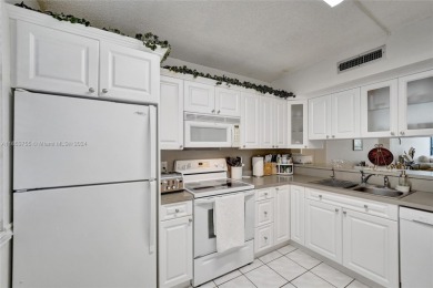 Welcome to this TOTALLY REMODELED condo located in an all-age on Pine Island Ridge Country Club in Florida - for sale on GolfHomes.com, golf home, golf lot