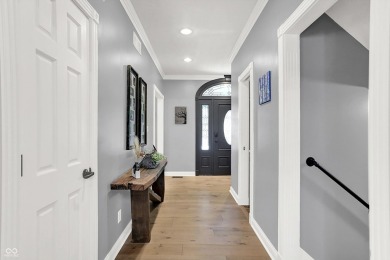 Experience luxury living in this impeccably crafted two-story on Foxcliff Golf Club in Indiana - for sale on GolfHomes.com, golf home, golf lot