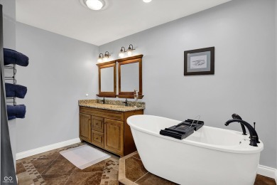 Experience luxury living in this impeccably crafted two-story on Foxcliff Golf Club in Indiana - for sale on GolfHomes.com, golf home, golf lot