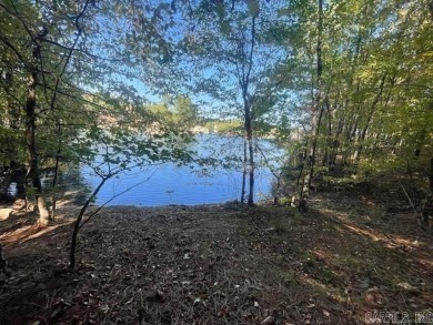 Attention Builders! This exceptional lakefront lot located in a on Granada Golf Course in Arkansas - for sale on GolfHomes.com, golf home, golf lot