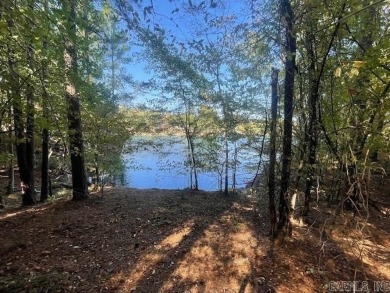 Attention Builders! This exceptional lakefront lot located in a on Granada Golf Course in Arkansas - for sale on GolfHomes.com, golf home, golf lot