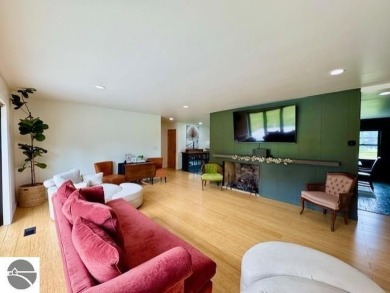 Discover 2,200 sq. ft. of luxurious, single-level living in this on Pine River Country Club in Michigan - for sale on GolfHomes.com, golf home, golf lot