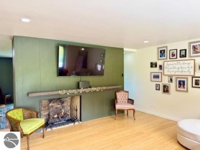 Discover 2,200 sq. ft. of luxurious, single-level living in this on Pine River Country Club in Michigan - for sale on GolfHomes.com, golf home, golf lot
