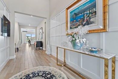 Enjoy stunning wide lake views from the back yard of this on Palm Beach Gardens Golf Course in Florida - for sale on GolfHomes.com, golf home, golf lot