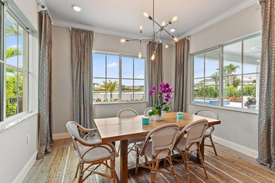 Enjoy stunning wide lake views from the back yard of this on Palm Beach Gardens Golf Course in Florida - for sale on GolfHomes.com, golf home, golf lot