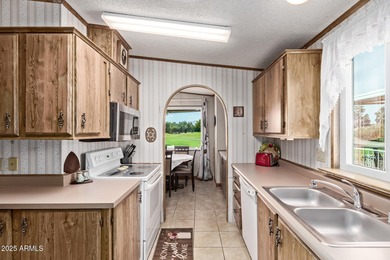 GOLF COURSE VIEWS!!! Located in the guard-gated 55+ community of on Great Eagle Golf Club in Arizona - for sale on GolfHomes.com, golf home, golf lot