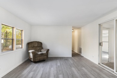 Remodeled in 2024, this 3-bedroom, 1-bath home in Lakes of the on Lakes of the North Deer Run Golf Course in Michigan - for sale on GolfHomes.com, golf home, golf lot