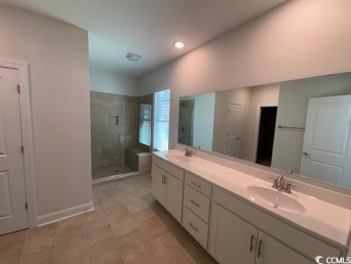 This beautiful 4-bedroom, 2-bathroom home is located in the on Surf Golf and Beach Club in South Carolina - for sale on GolfHomes.com, golf home, golf lot