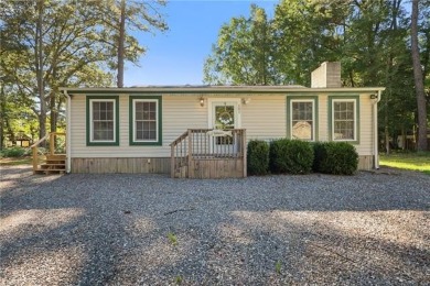 Welcome to this beautifully maintained 2-bedroom, 2 full bath on Piankatank River Golf Club in Virginia - for sale on GolfHomes.com, golf home, golf lot