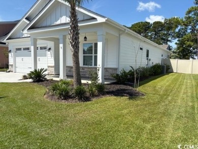 This beautiful 4-bedroom, 2-bathroom home is located in the on Surf Golf and Beach Club in South Carolina - for sale on GolfHomes.com, golf home, golf lot